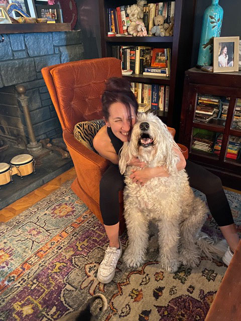 Vanesa and white fluffy dog